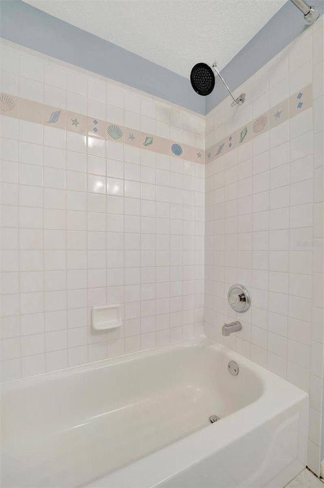 bathroom featuring tub / shower combination