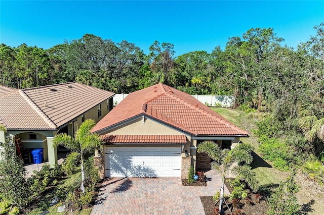 view of front of property with a garage