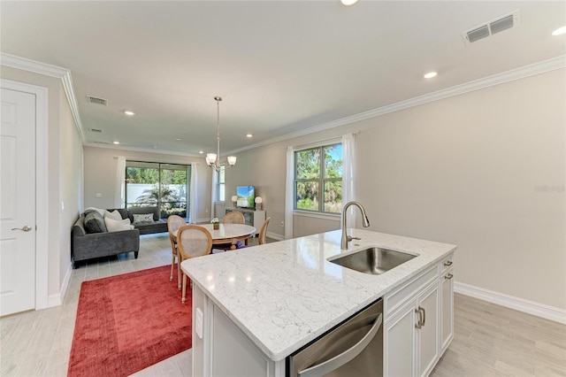 kitchen with sink, dishwasher, a kitchen island with sink, light stone countertops, and white cabinets