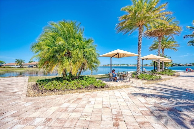 view of home's community with a water view