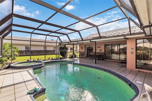 view of pool featuring a lanai, a pool with connected hot tub, and a patio