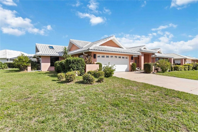 534 Warwick Ln, Venice, FL 34293 - view of front facade with a tile roof, stucco siding, a front yard, a garage, and driveway