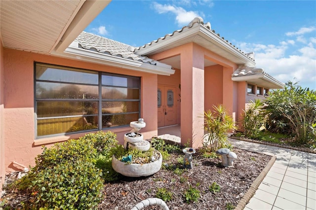 534 Warwick Ln, Venice, FL 34293 - exterior space featuring a tile roof and stucco siding