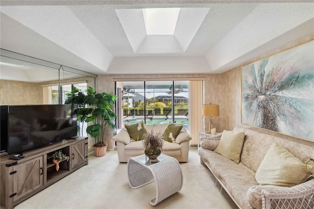 534 Warwick Ln, Venice, FL 34293 - living room with a raised ceiling, a textured ceiling, and light colored carpet