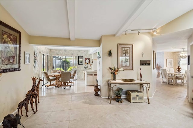 534 Warwick Ln, Venice, FL 34293 - interior space with light tile patterned flooring, plenty of natural light, and beam ceiling
