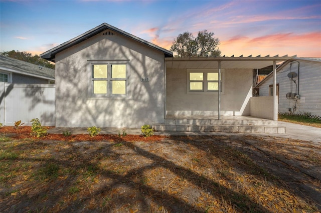 exterior space with stucco siding