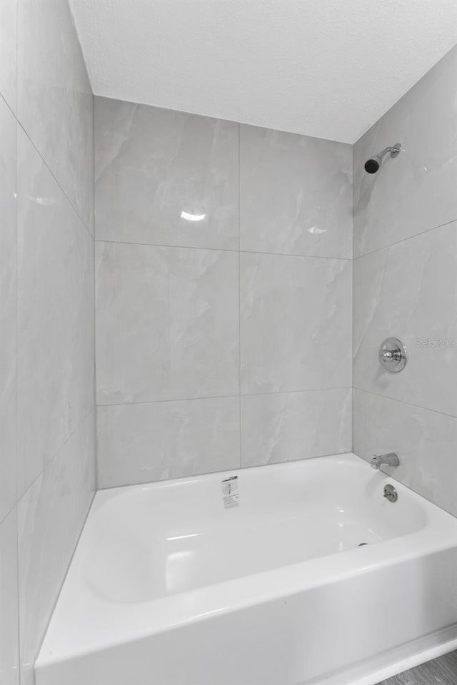 full bath with tub / shower combination
