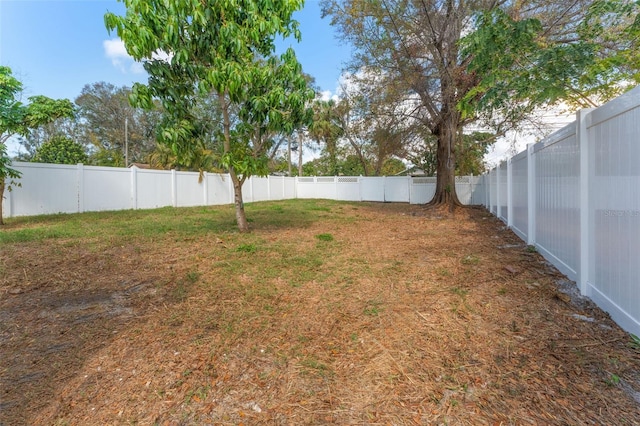 view of yard featuring a fenced backyard