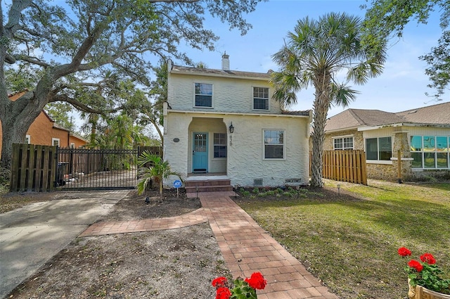 view of front of house with a front lawn