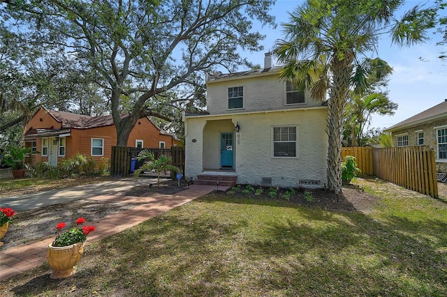 view of front facade with a front yard