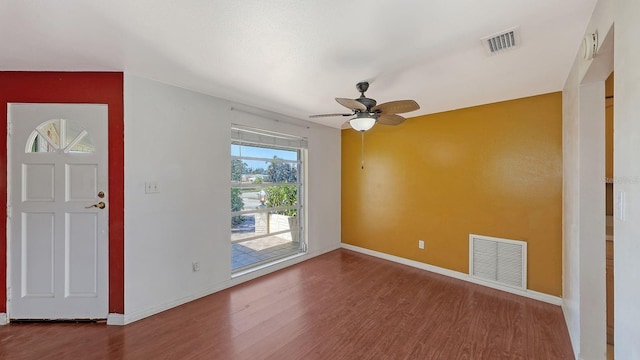 entryway with hardwood / wood-style flooring and ceiling fan