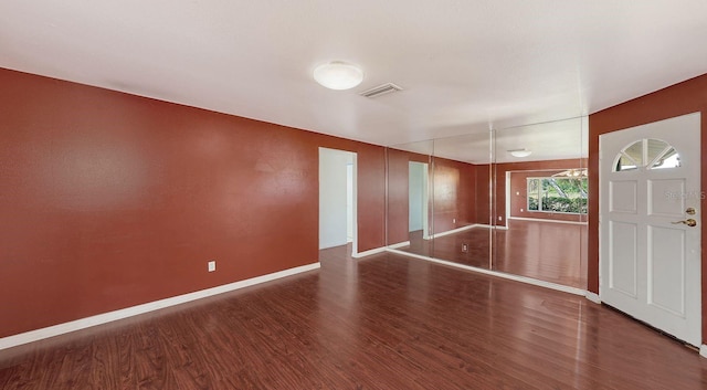 interior space with dark wood-type flooring