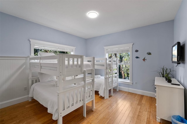 bedroom with hardwood / wood-style flooring