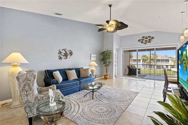 tiled living room featuring vaulted ceiling and ceiling fan