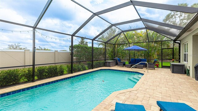 3839 Autumn Fern Ter, Sarasota, FL 34243 - outdoor pool featuring a patio, outdoor lounge area, a lanai, and fence