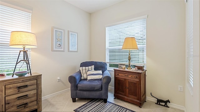 3839 Autumn Fern Ter, Sarasota, FL 34243 - living area with light tile patterned flooring and baseboards