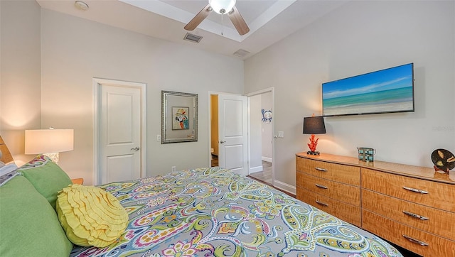 bedroom featuring visible vents, ceiling fan, and baseboards