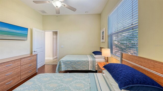 bedroom with wood finished floors and a ceiling fan