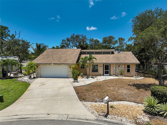 single story home featuring a garage