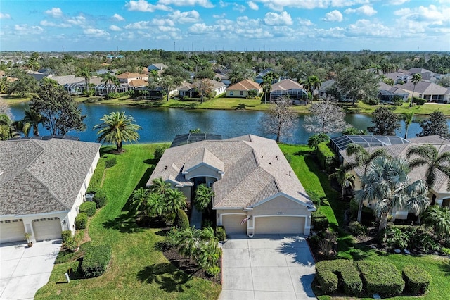 bird's eye view with a water view