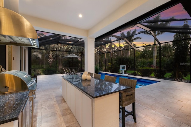 19424 Ganton Ave, Lakewood Ranch, FL 34202 - view of patio / terrace featuring glass enclosure, an outdoor pool, and outdoor dry bar