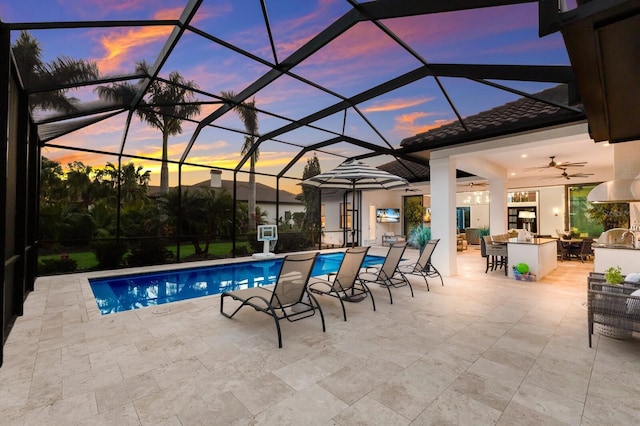 19424 Ganton Ave, Lakewood Ranch, FL 34202 - outdoor pool with glass enclosure, a patio, a ceiling fan, and outdoor dry bar
