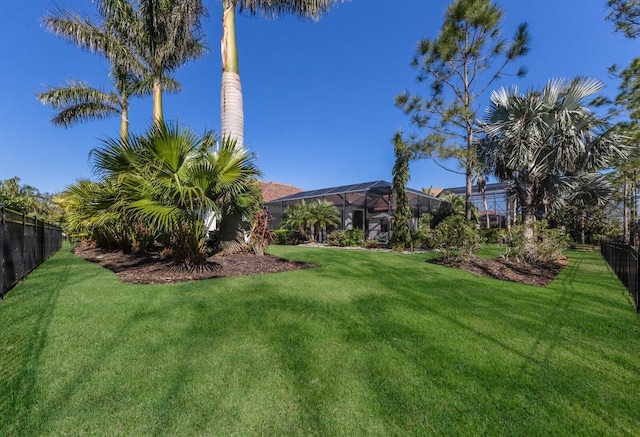 19424 Ganton Ave, Lakewood Ranch, FL 34202 - view of yard featuring glass enclosure and fence