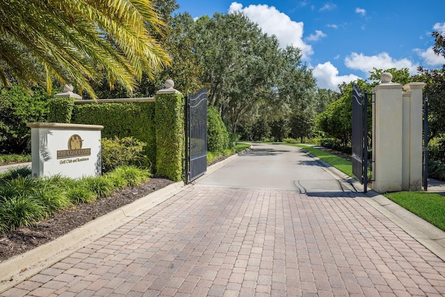 19424 Ganton Ave, Lakewood Ranch, FL 34202 - view of road featuring driveway, a gated entry, and a gate