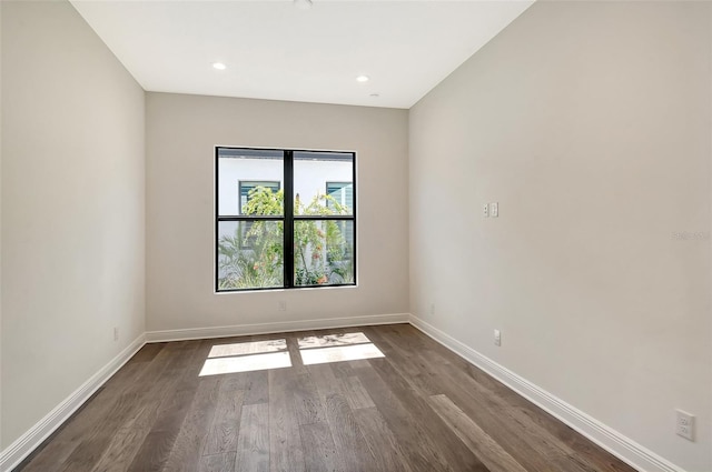 552 Bocelli Dr, North Venice, FL 34275 - spare room featuring recessed lighting, baseboards, and dark wood-style flooring