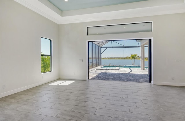552 Bocelli Dr, North Venice, FL 34275 - doorway featuring tile patterned floors, baseboards, a water view, and a sunroom