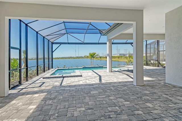 552 Bocelli Dr, North Venice, FL 34275 - outdoor pool featuring a jacuzzi, a water view, a patio, and glass enclosure