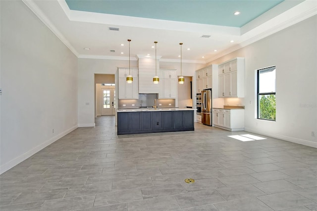 552 Bocelli Dr, North Venice, FL 34275 - kitchen with open floor plan, white cabinets, freestanding refrigerator, and a healthy amount of sunlight