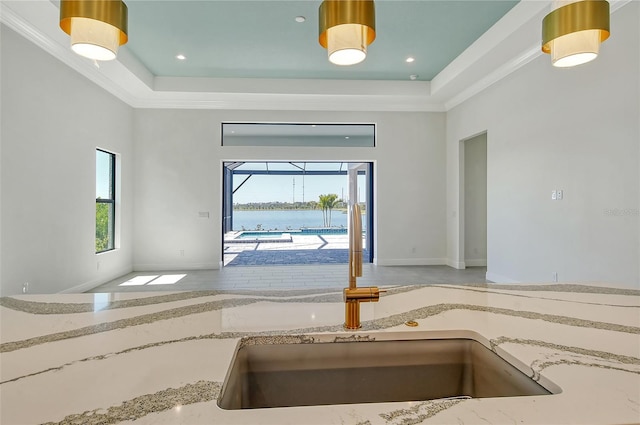 552 Bocelli Dr, North Venice, FL 34275 - interior space featuring a high ceiling, a tray ceiling, and a water view