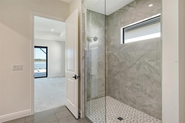 552 Bocelli Dr, North Venice, FL 34275 - full bath featuring baseboards, walk in shower, a water view, and tile patterned flooring
