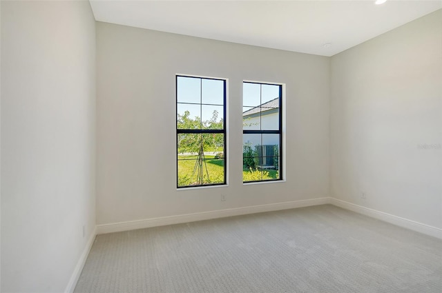 552 Bocelli Dr, North Venice, FL 34275 - spare room featuring recessed lighting, baseboards, and light carpet