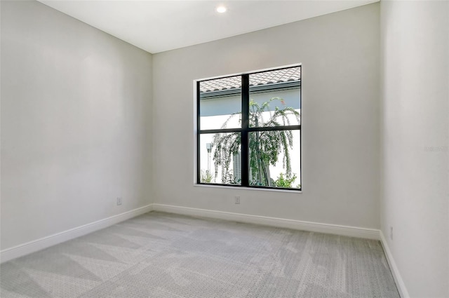 552 Bocelli Dr, North Venice, FL 34275 - spare room with baseboards and light colored carpet