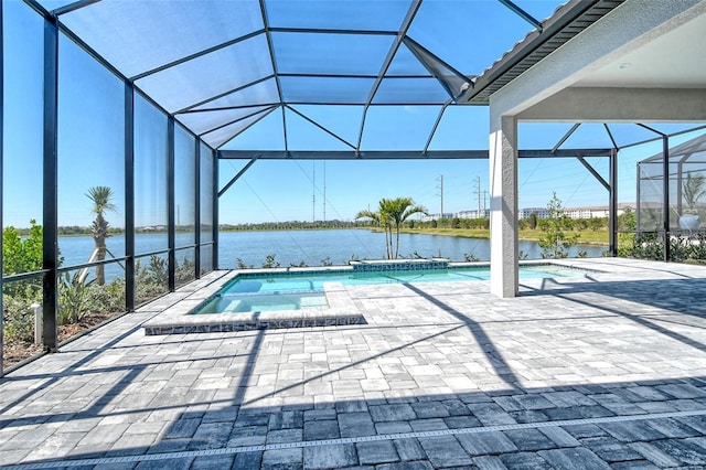 552 Bocelli Dr, North Venice, FL 34275 - outdoor pool with an in ground hot tub, a patio area, a water view, and a lanai