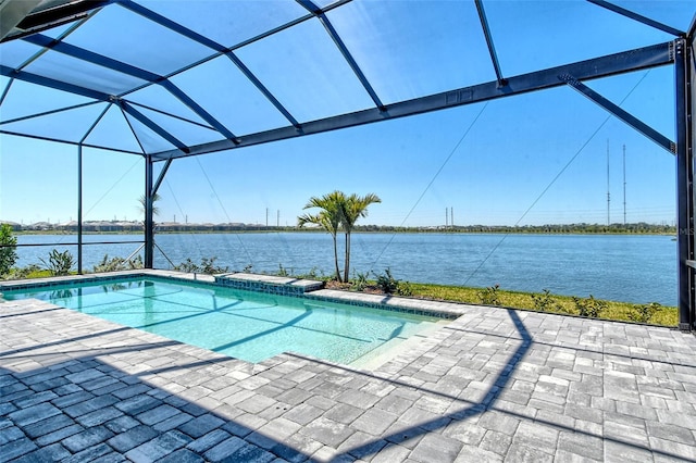 552 Bocelli Dr, North Venice, FL 34275 - outdoor pool featuring glass enclosure, a patio, and a water view