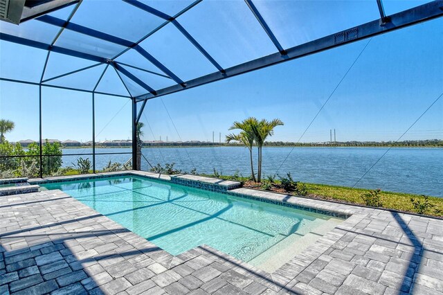 552 Bocelli Dr, North Venice, FL 34275 - outdoor pool with glass enclosure, a water view, and a patio area