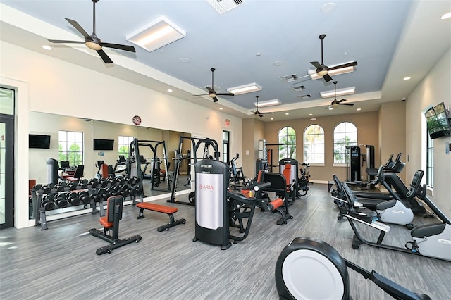 552 Bocelli Dr, North Venice, FL 34275 - gym featuring visible vents, recessed lighting, and a tray ceiling