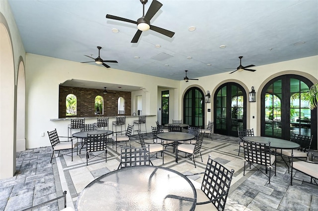 552 Bocelli Dr, North Venice, FL 34275 - view of patio featuring ceiling fan, french doors, and outdoor dining space