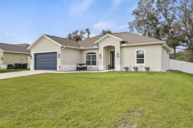 ranch-style house featuring a garage and a front lawn