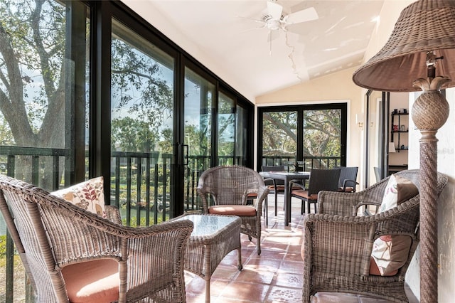 sunroom / solarium with vaulted ceiling and ceiling fan