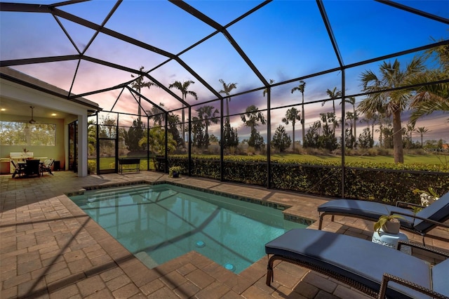 pool featuring a lanai and a patio