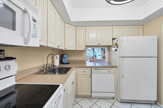 kitchen with crown molding, white appliances, a raised ceiling, and sink