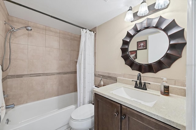 full bathroom featuring vanity, toilet, and shower / bath combo