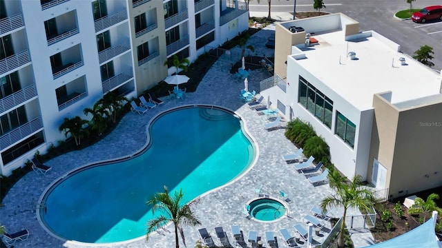 view of pool featuring a hot tub