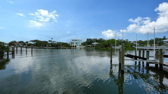 view of dock featuring a water view and boat lift