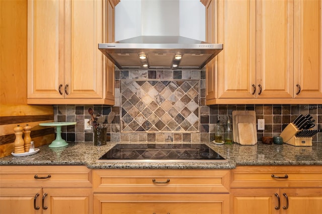 kitchen with black electric cooktop, extractor fan, backsplash, and dark stone countertops