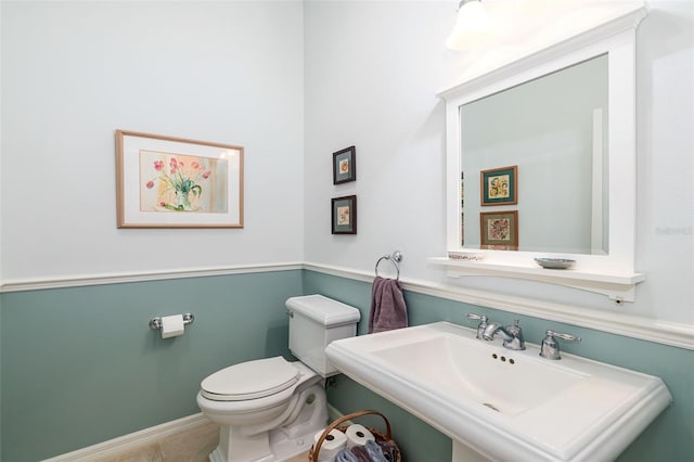 bathroom with sink and toilet